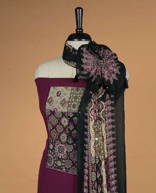 Wine colour georgette salwar suit collection featuring plain body enhanced with elegant black bunch kalamkari print on neck yoke, detailed with subtle mirror work , paired with kalamkari printed dupatta with mirror work with santon material bottom.