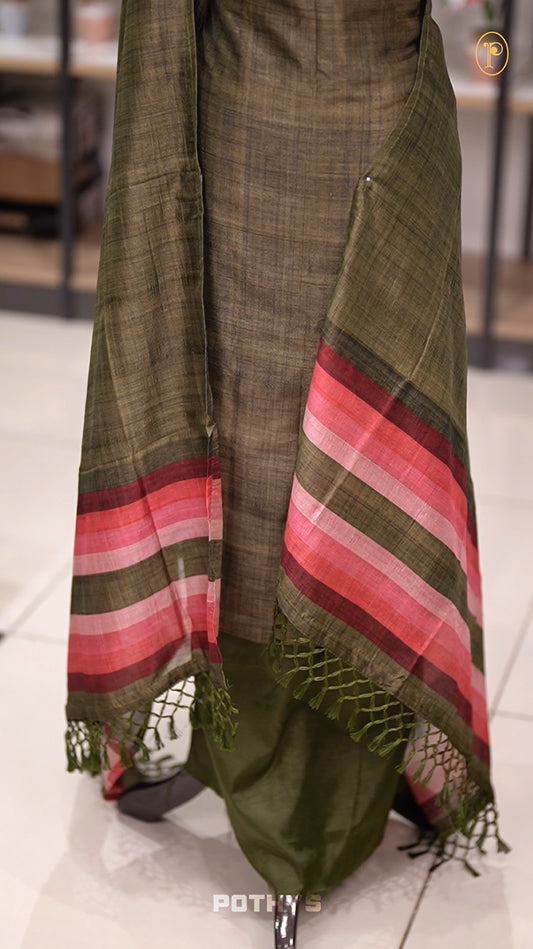 Army green colour semi tussar silk salwar material featuring elegant horizontal stripes on the yoke and dupatta, woven in shades of maroon and peach & Paired with a matching plain bottom.
