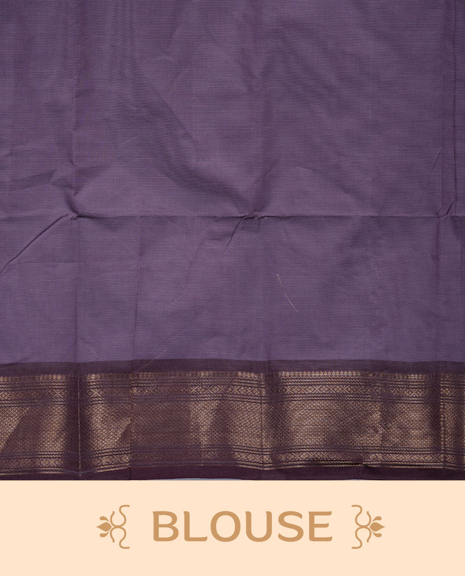 Dark lavender colour chettinad cotton saree featuring small gold zari buttas on body highlighting contrast magenta purple colour with gold zari traditional border, pallu and paired with matching blouse piece.