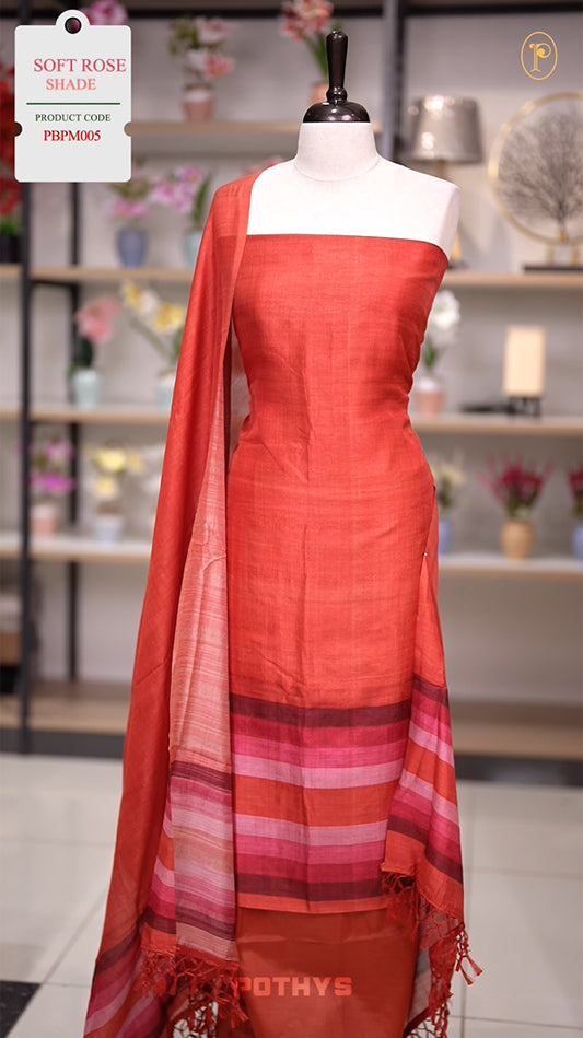 Soft rose colour semi tussar silk salwar material featuring elegant horizontal stripes on the yoke and dupatta, woven in shades of rose and maroon & Paired with a matching plain bottom.