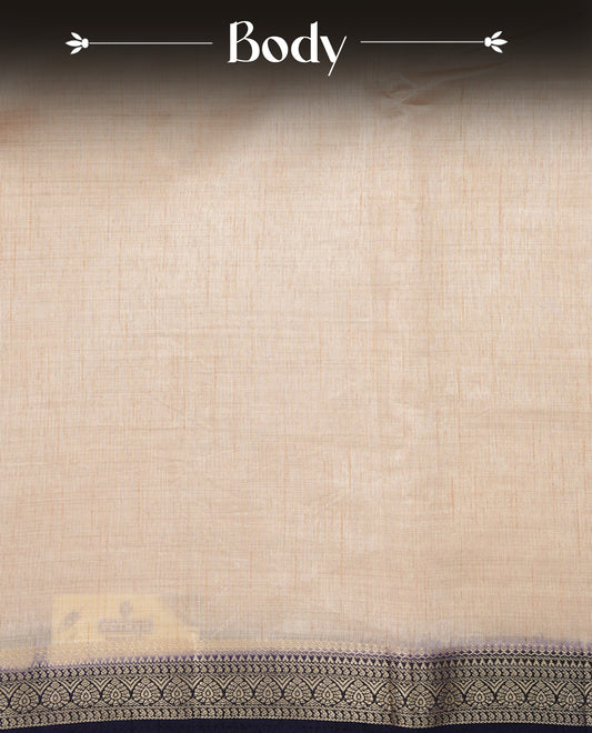 Cream colour Semi Tussar silk saree featuring an elegant plain body, accentuated by a contrast Navy blue border adorned with intricate gold zari work, paired with a matching blouse piece.