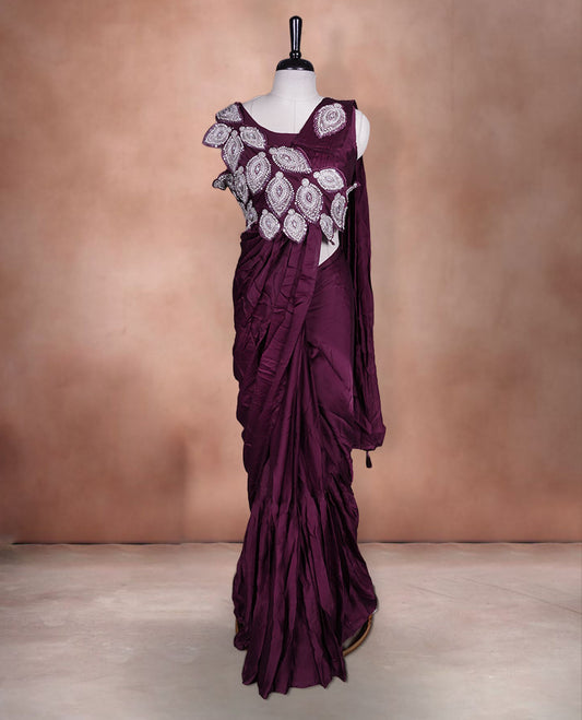 Deep maroon colour ready to wear saree featuring bold silver applique embroidery on the drape, paired with a sculpted matching blouse