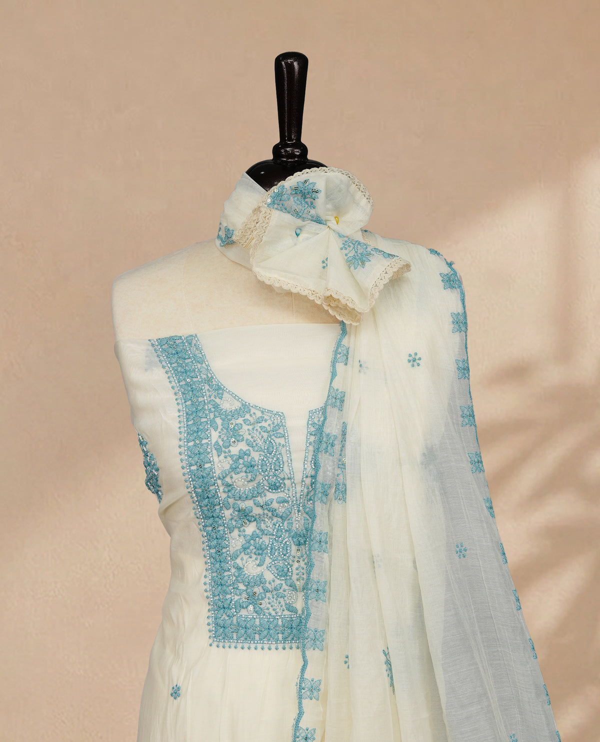Ivory Colour Mul Chanderi Salwar material featuring Light Blue Embroidery & Delicate Bead Work on body, paired with Santon bottom & Embroidery Worked Dupatta With Scallop border.
