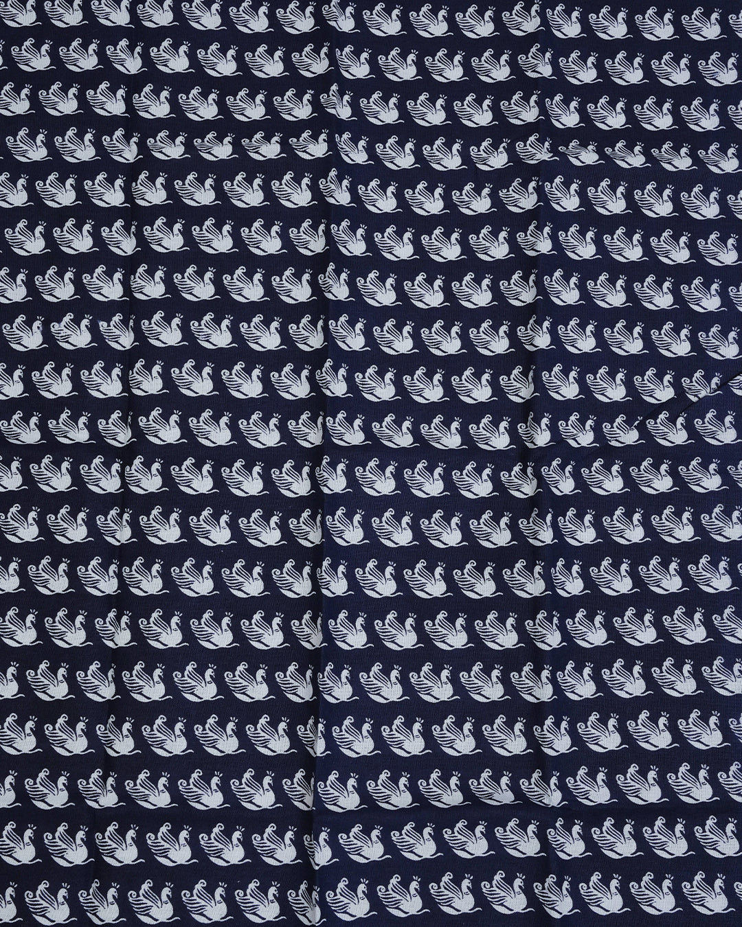 Cream colour cotton Set Mundu Features Plain body, Highlighting Blue colour Peacock Printed border.