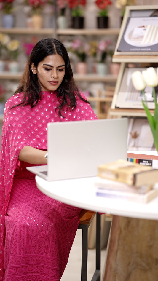 Pink colour Chiffon salwar material featuring elegant chikankari with sequins work on the top, paired with a beautifully mirror worked dupatta and a matching bottom piece for a graceful look.