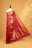 Red colour Chettinad cotton saree featuring Gold zari stripes on body, complemented by Self colour with Gold zari border, paired with matching blouse piece.