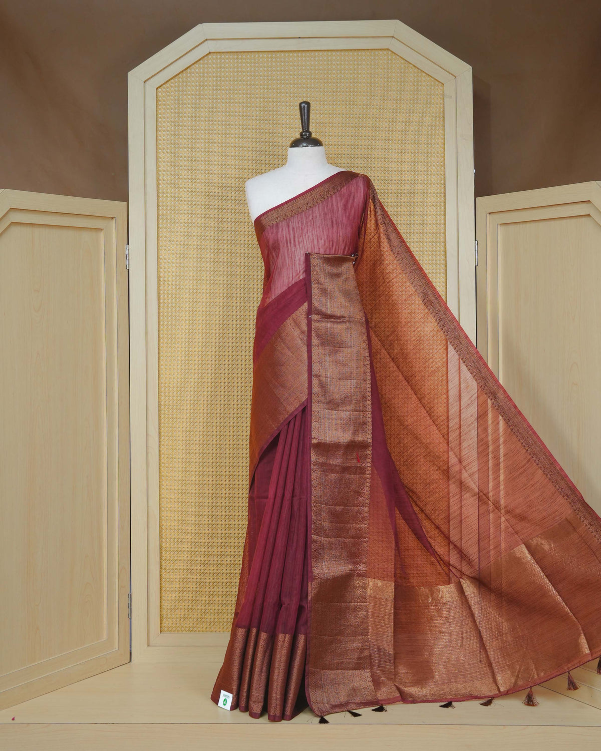 Brown colour semi linen saree plain body, contrast self colour gold zari detailed border, grand pallu comes with matching blouse piece
