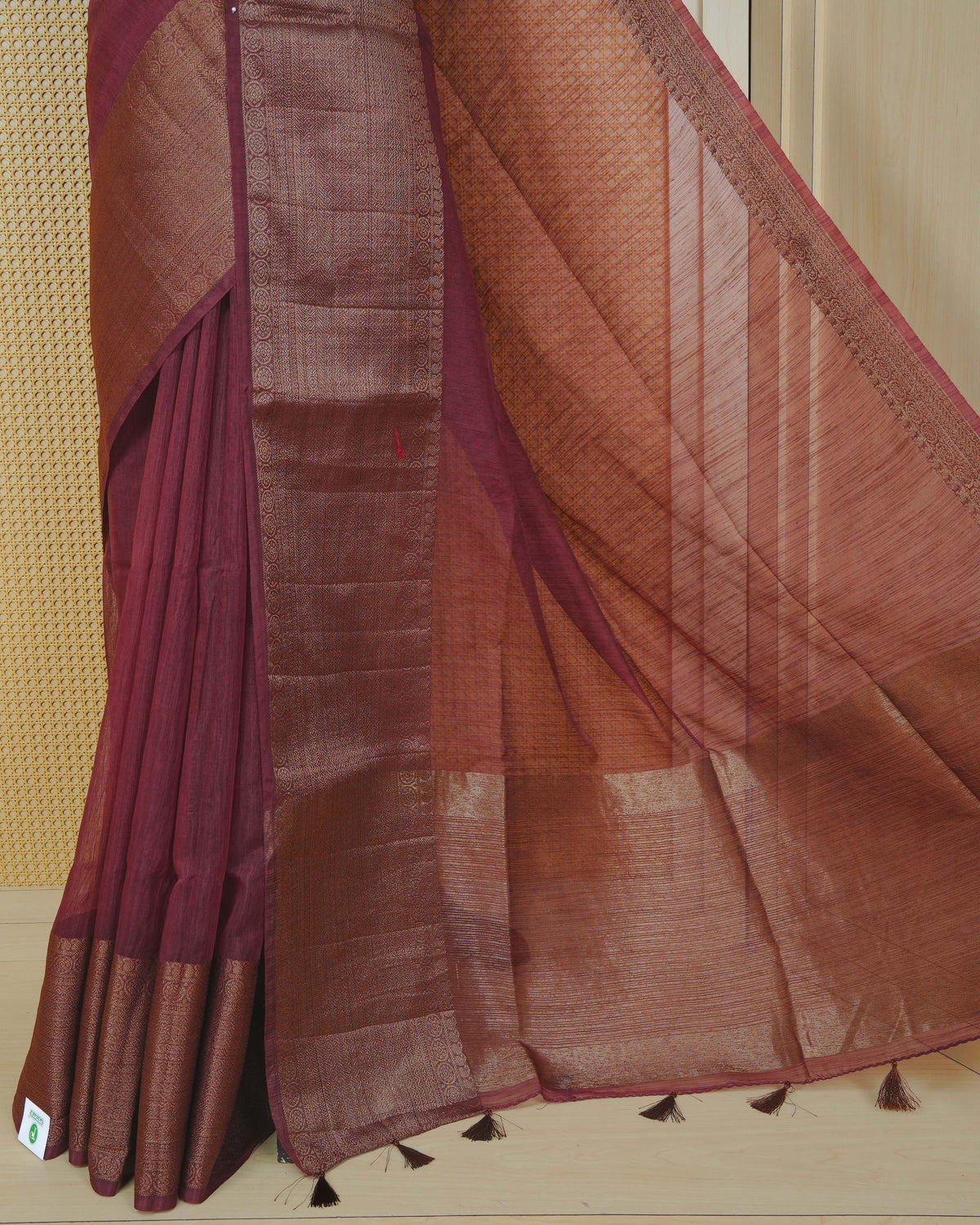 Brown colour semi linen saree plain body, contrast self colour gold zari detailed border, grand pallu comes with matching blouse piece