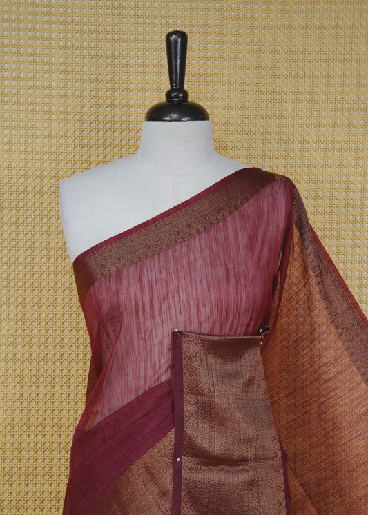 Brown colour semi linen saree plain body, contrast self colour gold zari detailed border, grand pallu comes with matching blouse piece