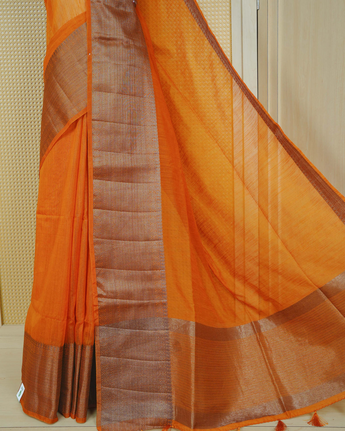Mustard colour semi linen saree plain body, contrast self colour gold zari detailed border, grand pallu comes with matching blouse piece