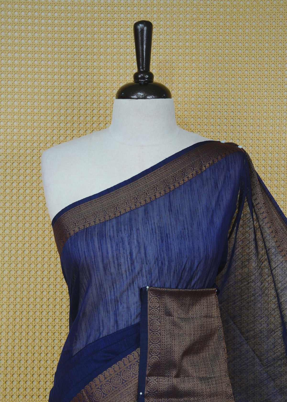 Dark navy blue colour semi linen saree plain body, contrast self colour gold zari detailed border, grand pallu comes with matching blouse piece