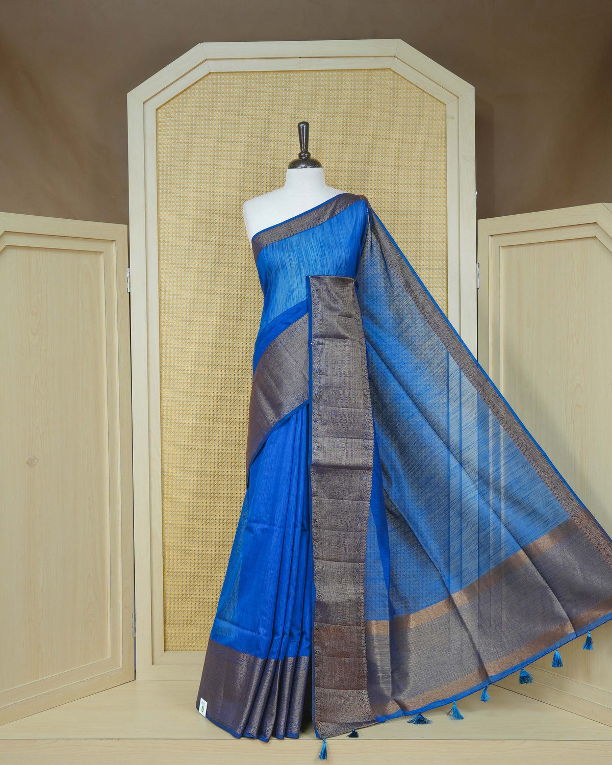 Blue colour semi linen saree plain body, contrast self colour gold zari detailed border, grand pallu comes with matching blouse piece