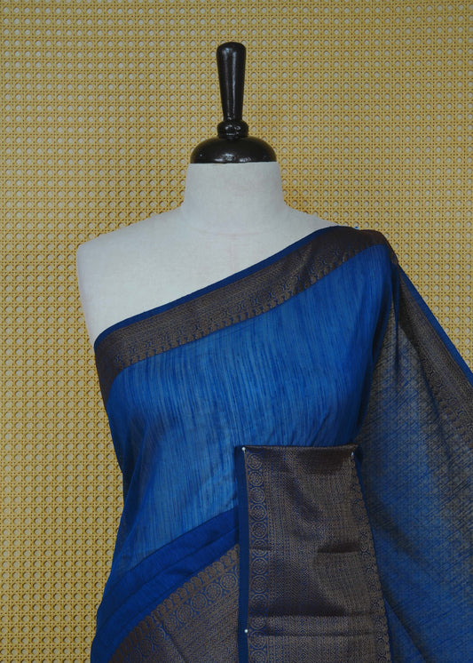 Blue colour semi linen saree plain body, contrast self colour gold zari detailed border, grand pallu comes with matching blouse piece