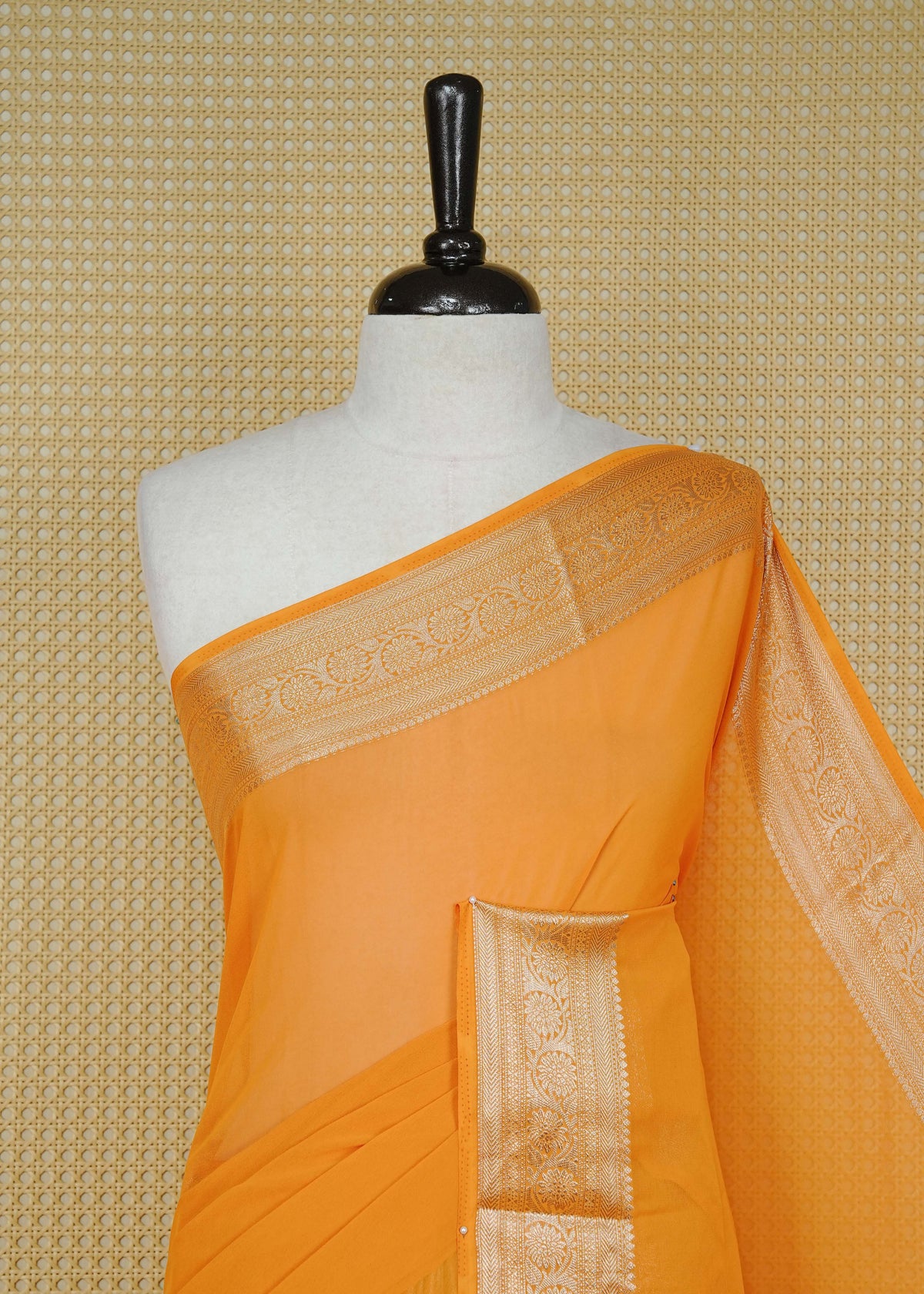 Yellow colour georgette saree having plain boy, Floral Gold zari detailed pattern border, comes with matching blouse piece