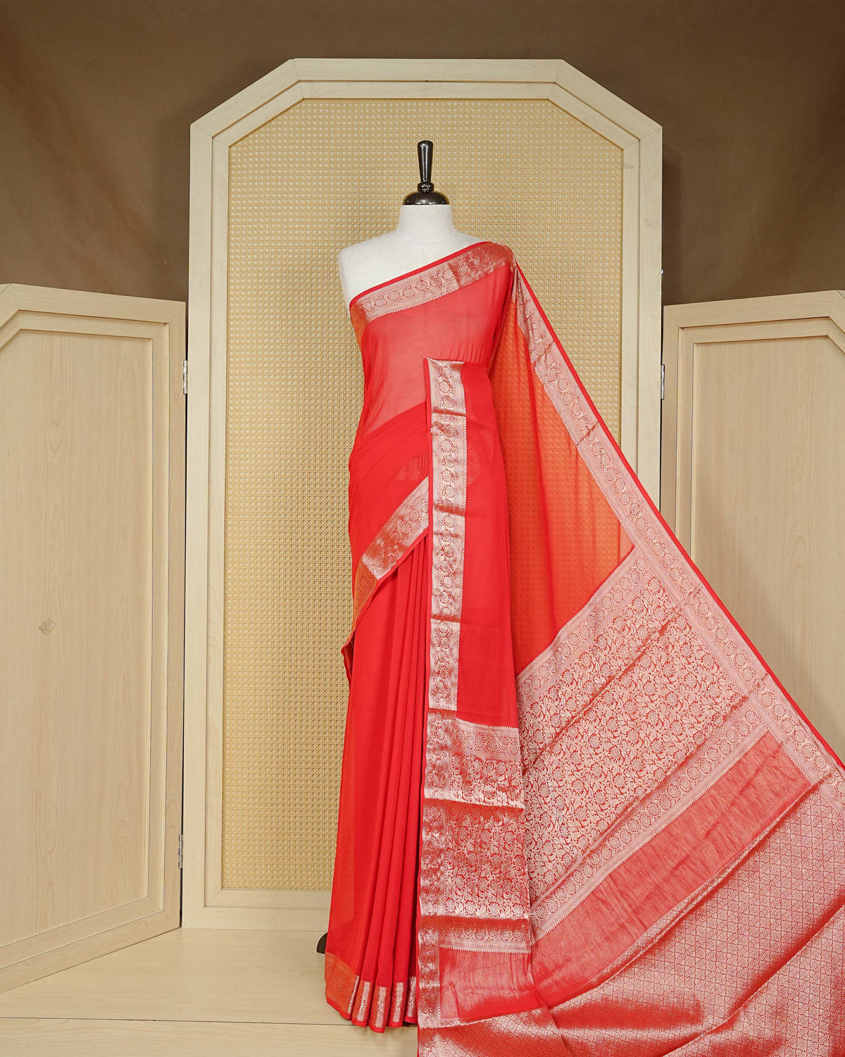 Vibrant red colour georgette saree having plain boy, Floral Gold zari detailed pattern border, comes with matching blouse piece