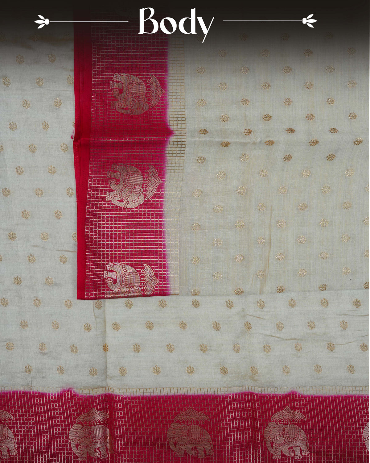 Cream colour Tussar silk saree Featuring buttas on body, complemented by Contrast pink colour gold zari check pattern with elephant motifs on border, paired with matching blouse piece.