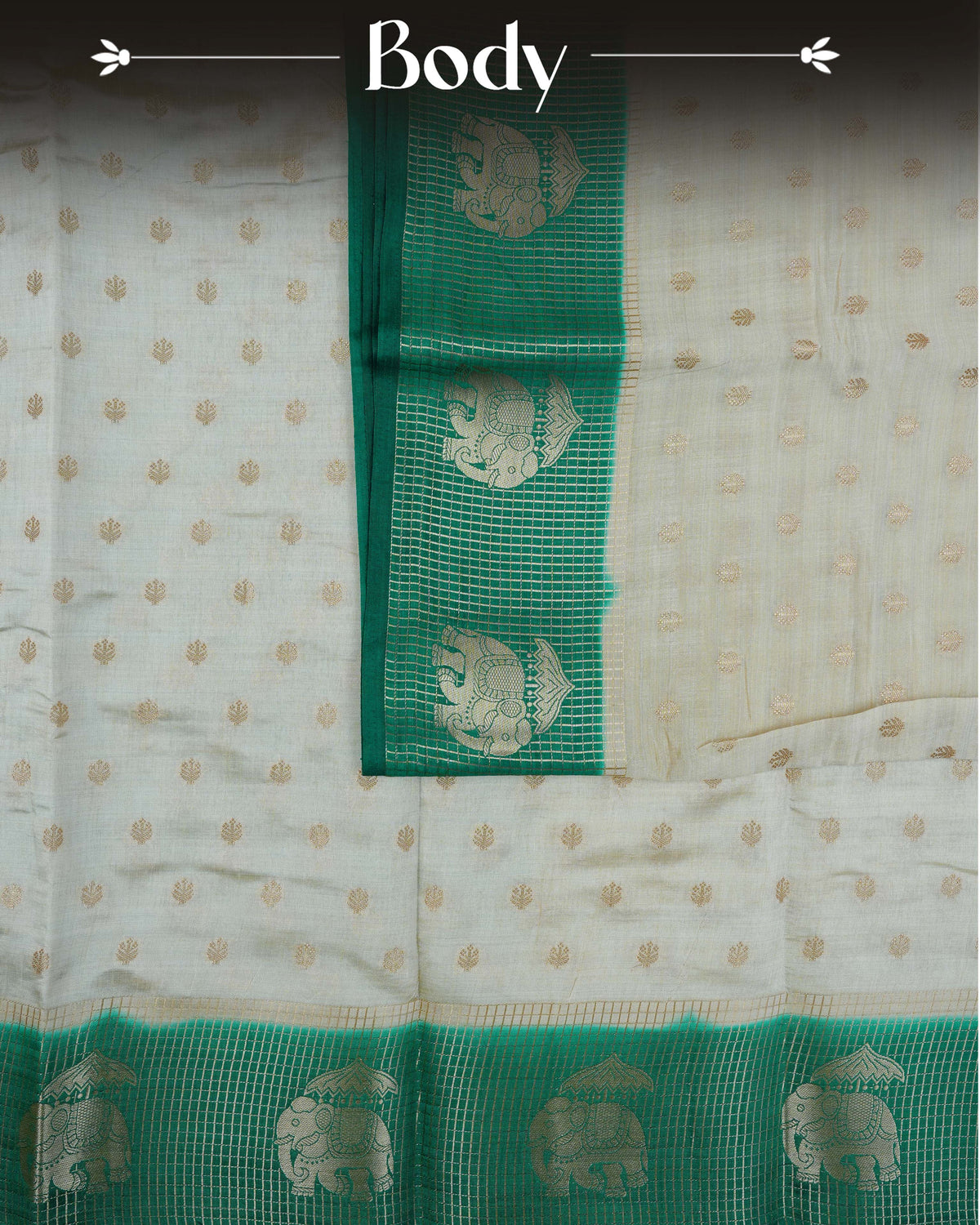 Cream colour Tussar silk saree Featuring buttas on body, complemented by Contrast green colour gold zari check pattern with elephant motifs on border, paired with matching blouse piece.