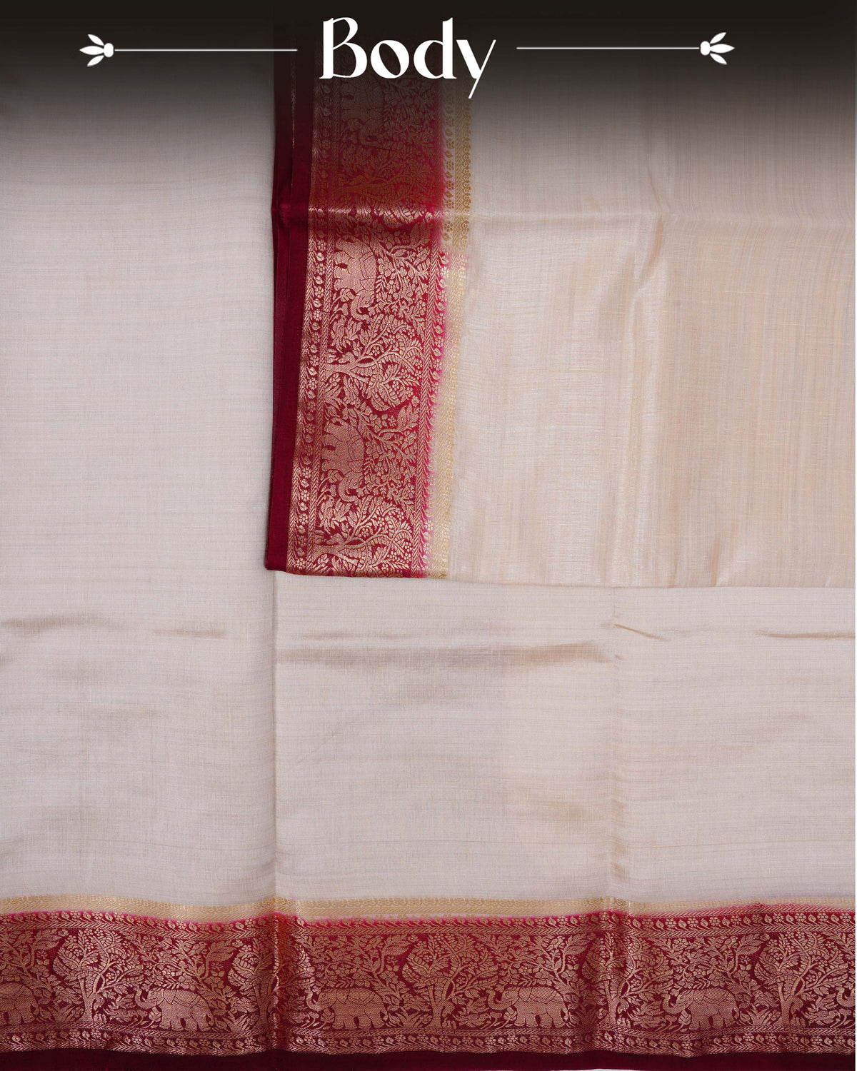 Cream colour Tussar silk saree Featuring Plain body, complemented by Contrast dark maroon colour gold zari elephant & tree motifs on border, paired with matching blouse piece.