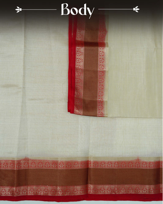 Cream colour Tussar silk saree Featuring Plain body, complemented by Contrast red colour double border with zari detailing, paired with matching blouse piece.