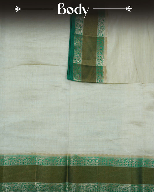 Cream colour Tussar silk saree Featuring Plain body, complemented by Contrast green colour double border with zari detailing, paired with matching blouse piece.