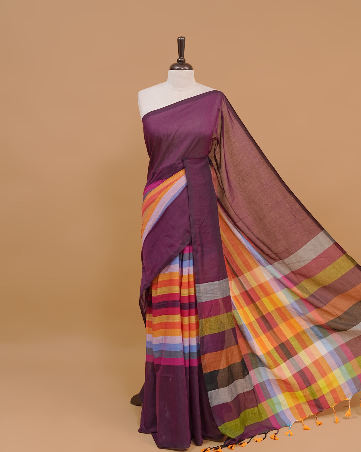 Deep Wine Colour Mul Cotton Saree Featuring Plain body. With out Border Golden Strips on pallu comes With Tassels