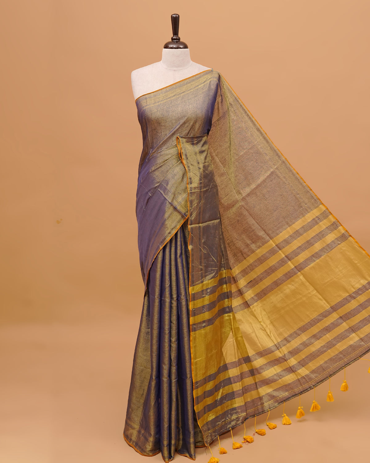 Blue Colour & Gold Shade Tissue Mul Cotton Saree Featuring Plain body. With out Border Golden Strips on pallu comes With Tassels
