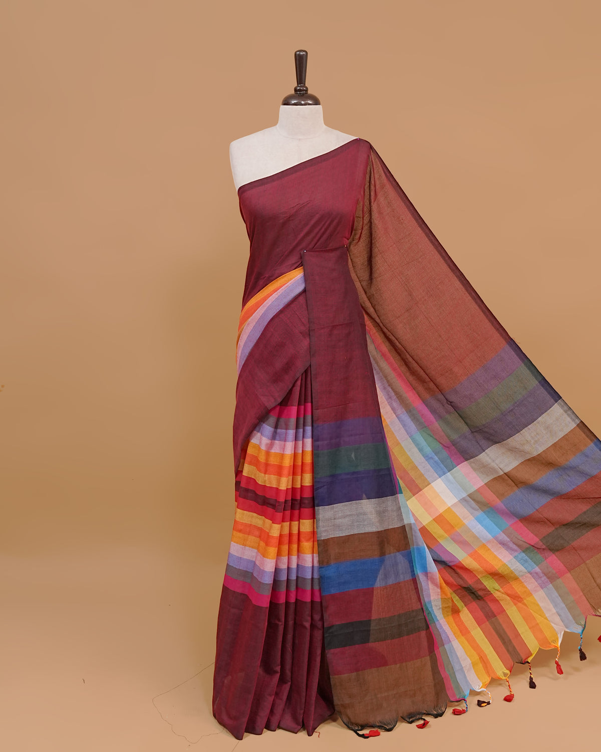 Maroon Colour Mul Cotton Saree Featuring Plain body. With out Border Golden Strips on pallu comes With Tassels