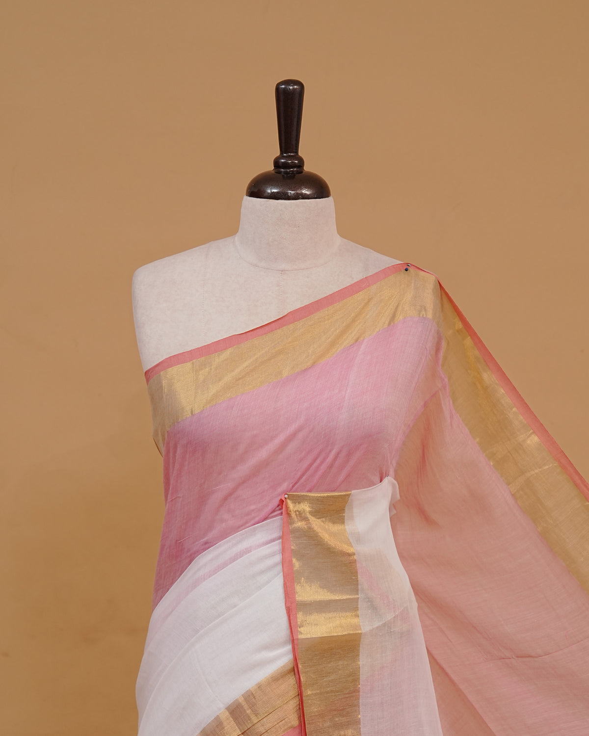 White Colour Mul Cotton Saree Featuring Plain body. With Contrast Gold and Blue Border, pallu comes With Blue Tassels