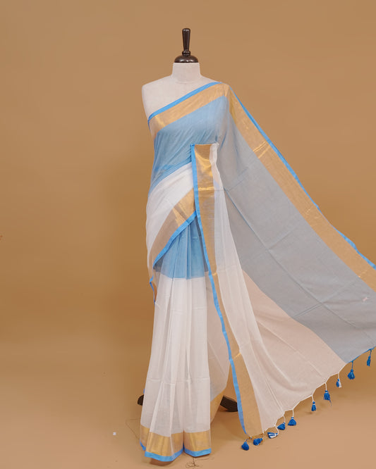 White Colour Mul Cotton Saree Featuring Plain body. With Contrast Gold and Blue Border, pallu comes With Blue Tassels
