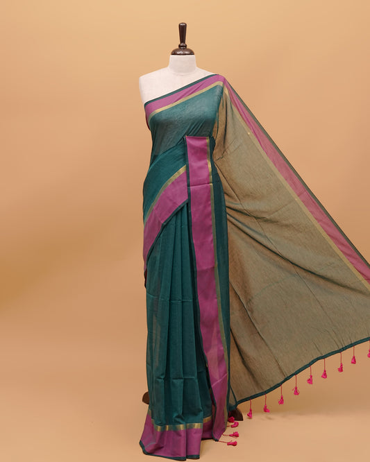 Peacock Green Colour Mul Cotton Saree Featuring Plain body, With Contrast Gold and Magenta Border, pallu comes With Tassels