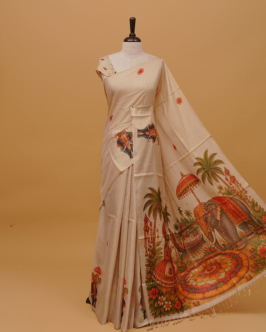 Cream colour Semi Tissue saree featuring Kerala Traditional Prints on the body, a Simple Border , and a pallu finished with tassels, paired with a matching blouse piece.