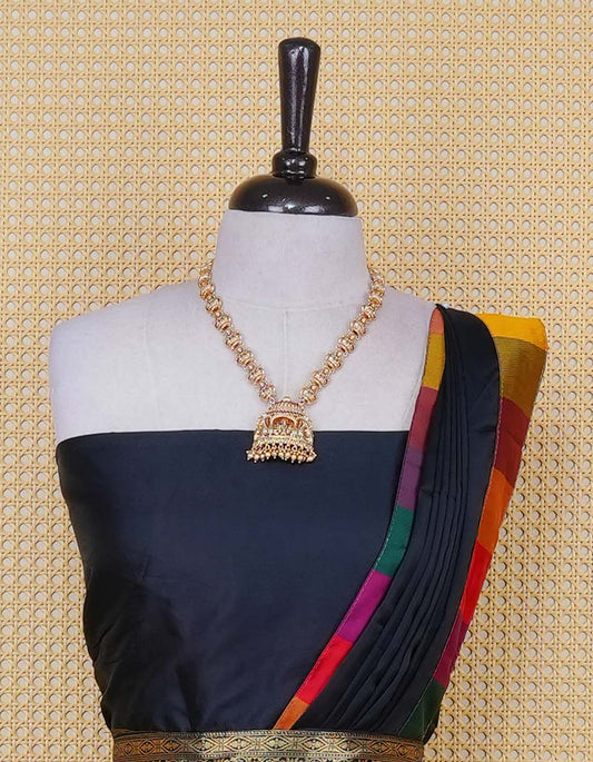 Black colour Semi Silk Semi stitched dhavani set featuring a Plain body with a matching Multi colour with gold zari bordered skirt & blouse piece and dupatta.