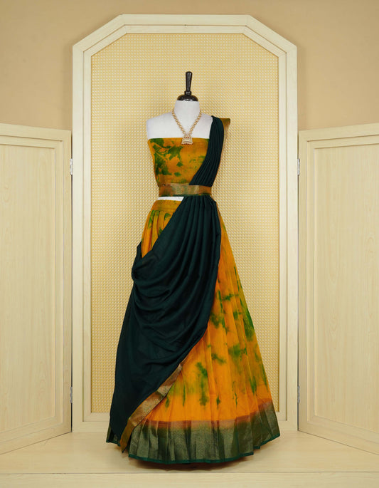 Mustard colour semi linen Semi Stitched dhavani set Featuring  Green Colour Ombre shaded Body & contrast Green Colour Border with Gold zari Details on skirt, Contrast Blouse piece & matching dupatta.