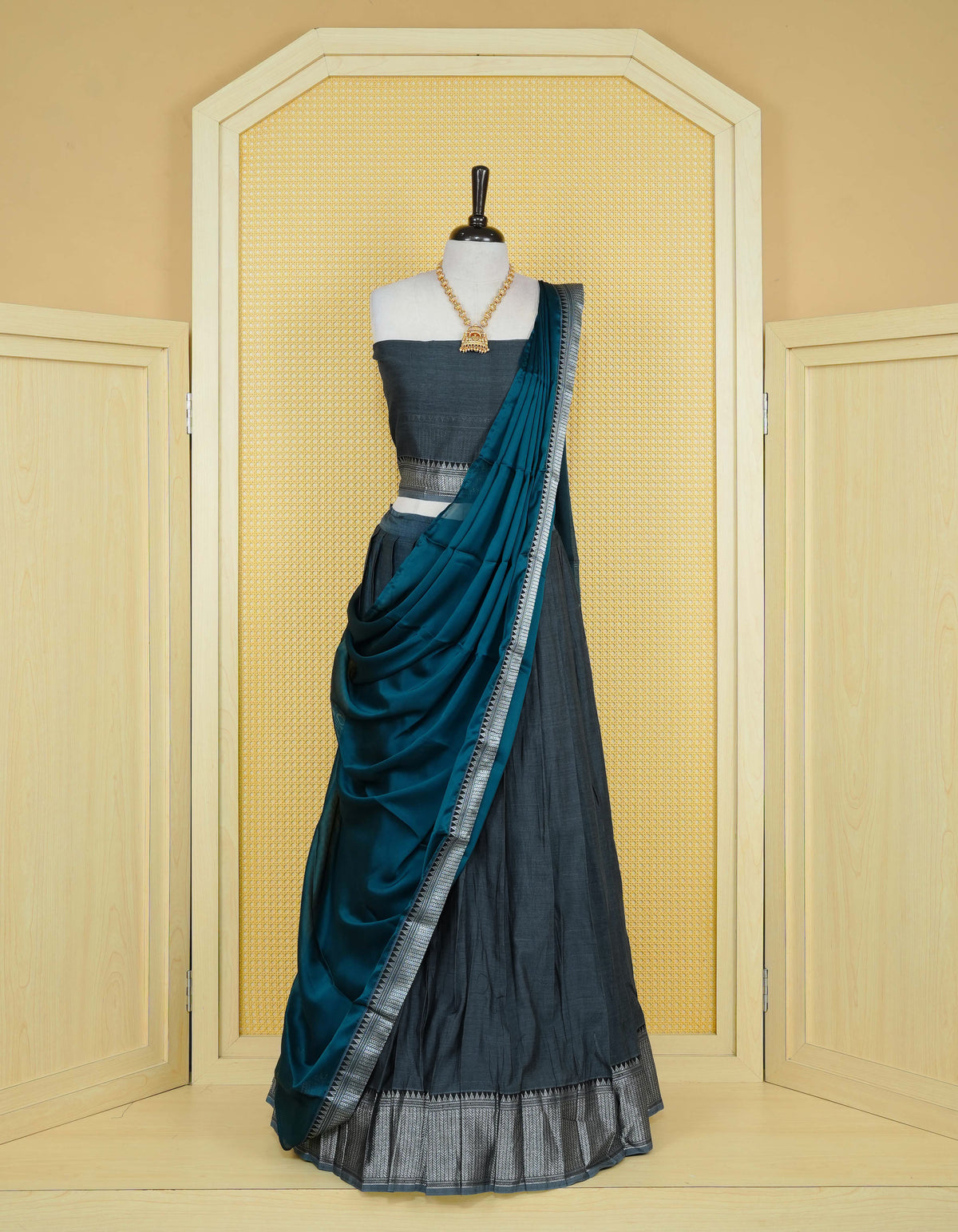 Slate Blue colour Chettinad Semi Stitched dhavani set Featuring contrast black Colour with Silver zari border on skirt, Contrast Blouse piece & matching dupatta.