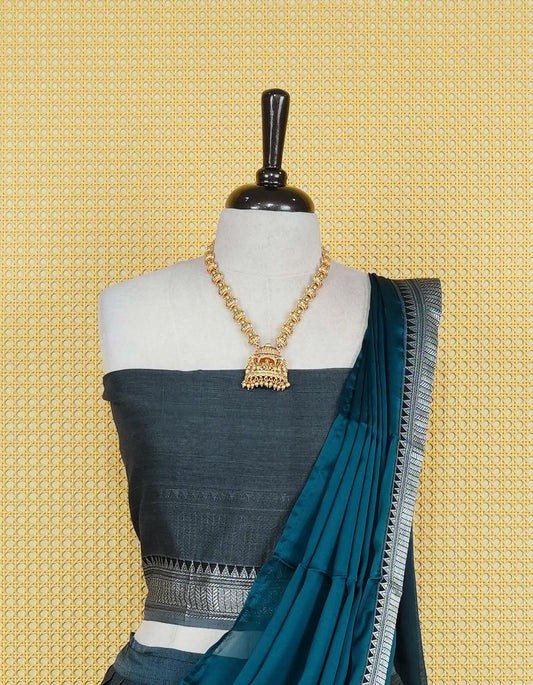 Slate Blue colour Chettinad Semi Stitched dhavani set Featuring contrast black Colour with Silver zari border on skirt, Contrast Blouse piece & matching dupatta.
