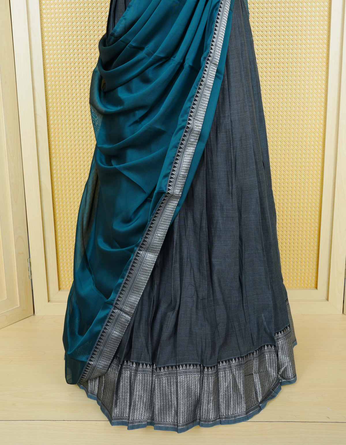 Slate Blue colour Chettinad Semi Stitched dhavani set Featuring contrast black Colour with Silver zari border on skirt, Contrast Blouse piece & matching dupatta.