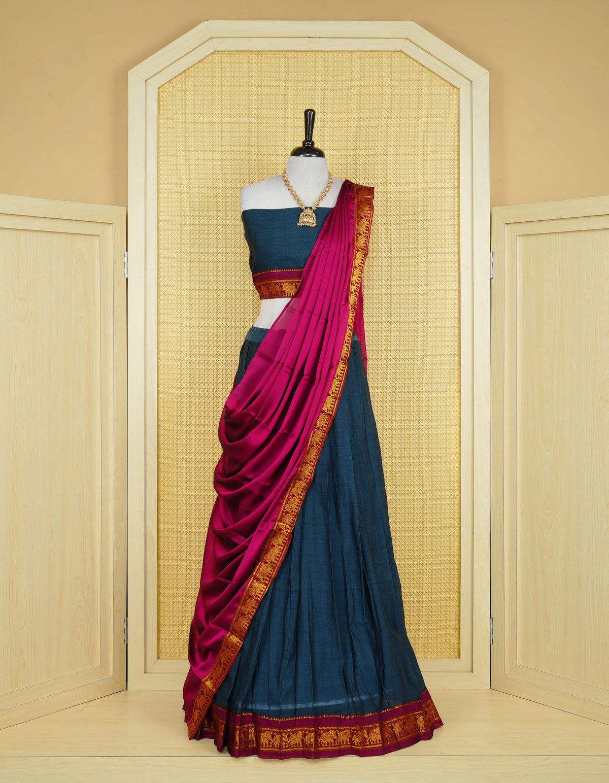 Dark Grey colour Chettinad Semi Stitched dhavani set Featuring contrast Magenta colour with Gold zari border on skirt, Contrast Blouse piece & matching dupatta.