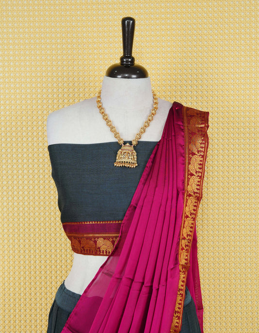 Dark Grey colour Chettinad Semi Stitched dhavani set Featuring contrast Magenta colour with Gold zari border on skirt, Contrast Blouse piece & matching dupatta.