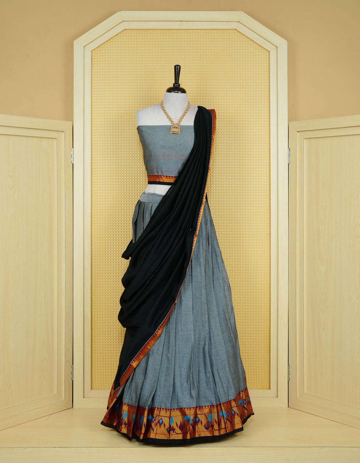 Grey colour Chettinad Semi Stitched dhavani set Featuring contrast Maroon colour with Gold zari border on skirt, Contrast Blouse piece & matching dupatta.