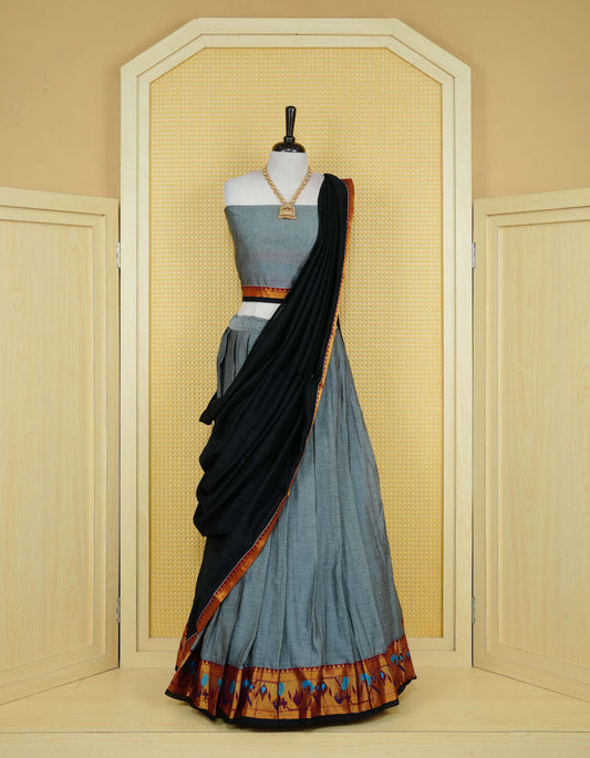 Grey colour Chettinad Semi Stitched dhavani set Featuring contrast Maroon colour with Gold zari border on skirt, Contrast Blouse piece & matching dupatta.