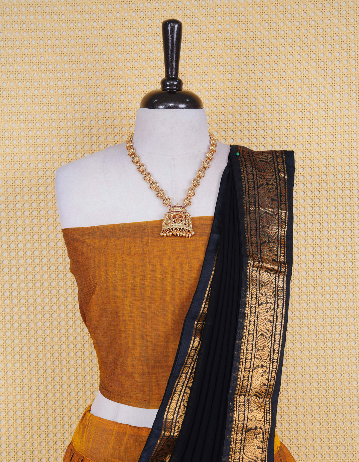 Mustard colour Chettinad Semi Stitched dhavani set Featuring contrast Black with Gold zari border on skirt, Contrast Blouse piece & matching dupatta.