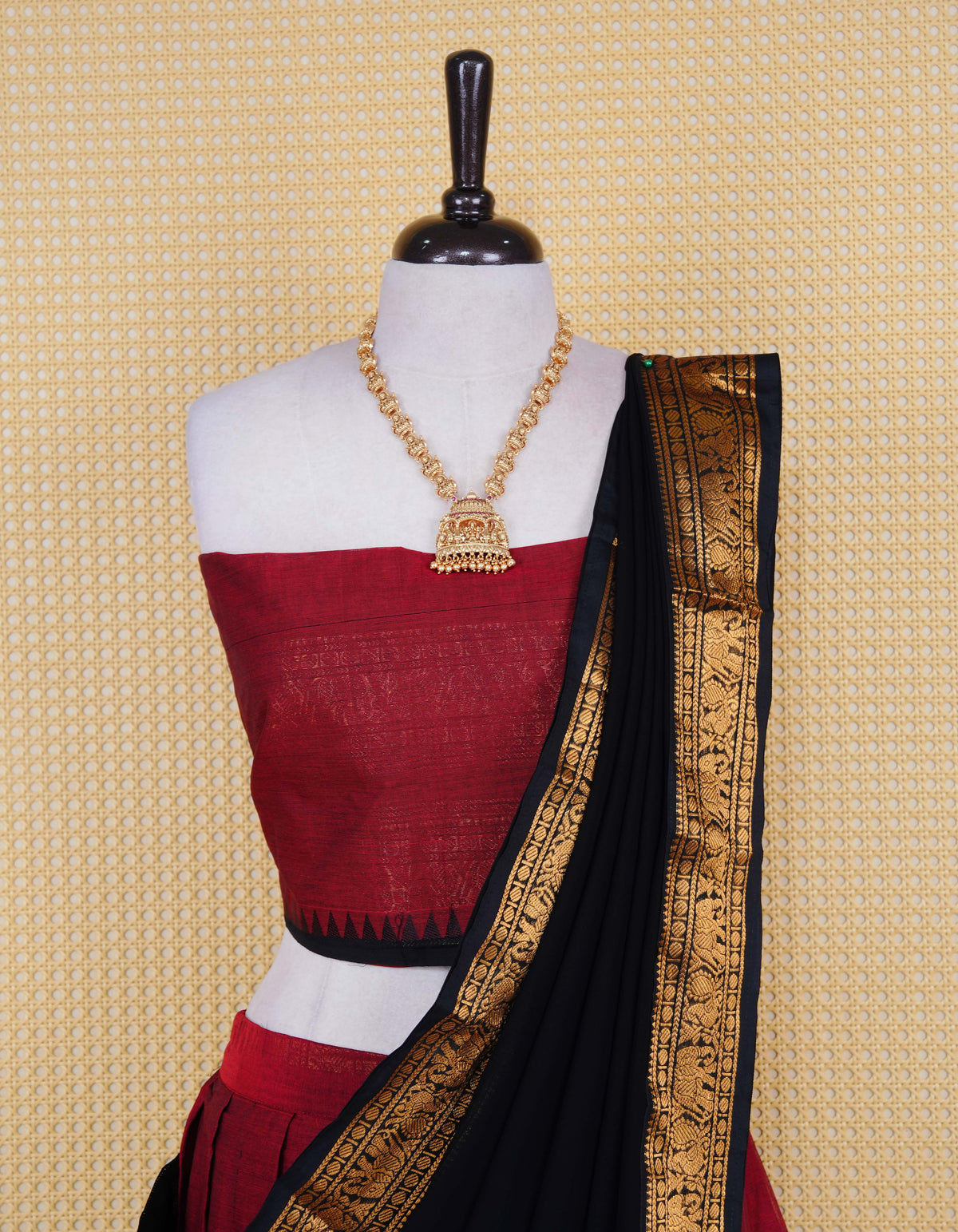 Brick Red colour Chettinad Semi Stitched dhavani set Featuring contrast Black colour with Gold zari border on skirt, Contrast Blouse piece & matching dupatta.