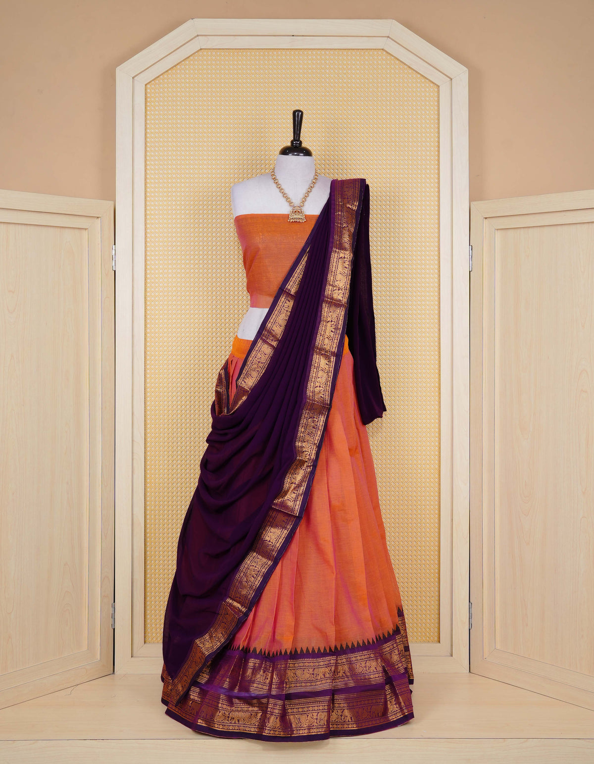 Rust Orange colour Chettinad Semi Stitched dhavani set Featuring contrast Purple colour with Gold zari border on skirt, Contrast Blouse piece & matching dupatta.