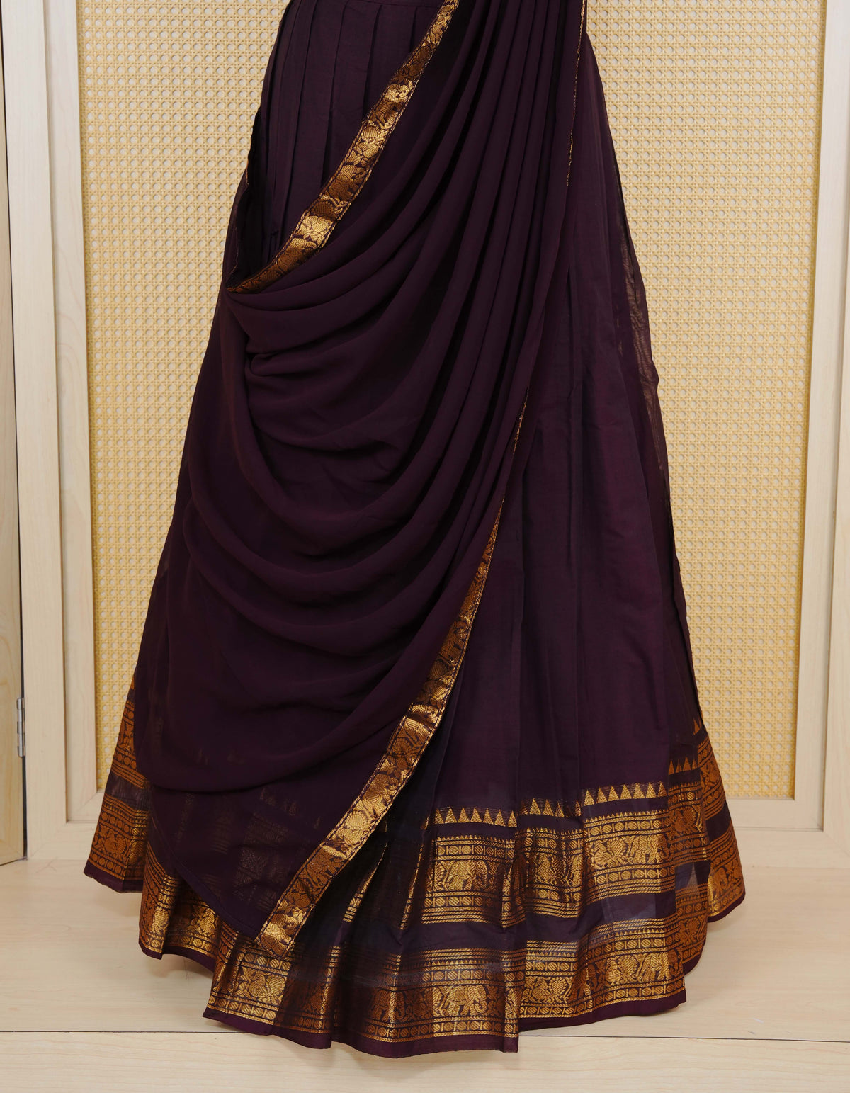 Dark Chocolate brown colour Chettinad Semi Stitched dhavani set Featuring contrast self colour with Gold zari border on skirt, Contrast Blouse piece & matching dupatta.