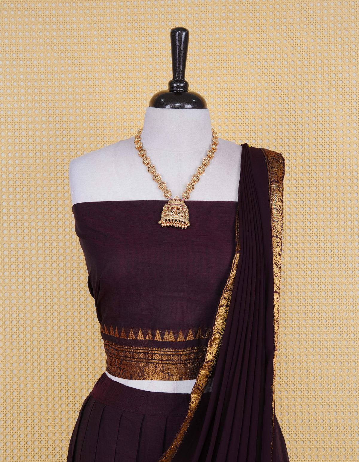 Dark Chocolate brown colour Chettinad Semi Stitched dhavani set Featuring contrast self colour with Gold zari border on skirt, Contrast Blouse piece & matching dupatta.