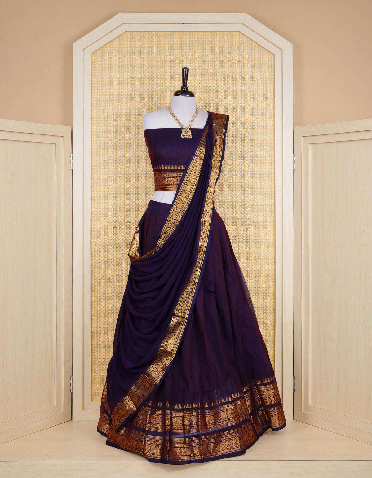 Deep Purple colour Chettinad Semi Stitched dhavani set Featuring contrast self colour with Gold zari border on skirt, Contrast Blouse piece & matching dupatta.