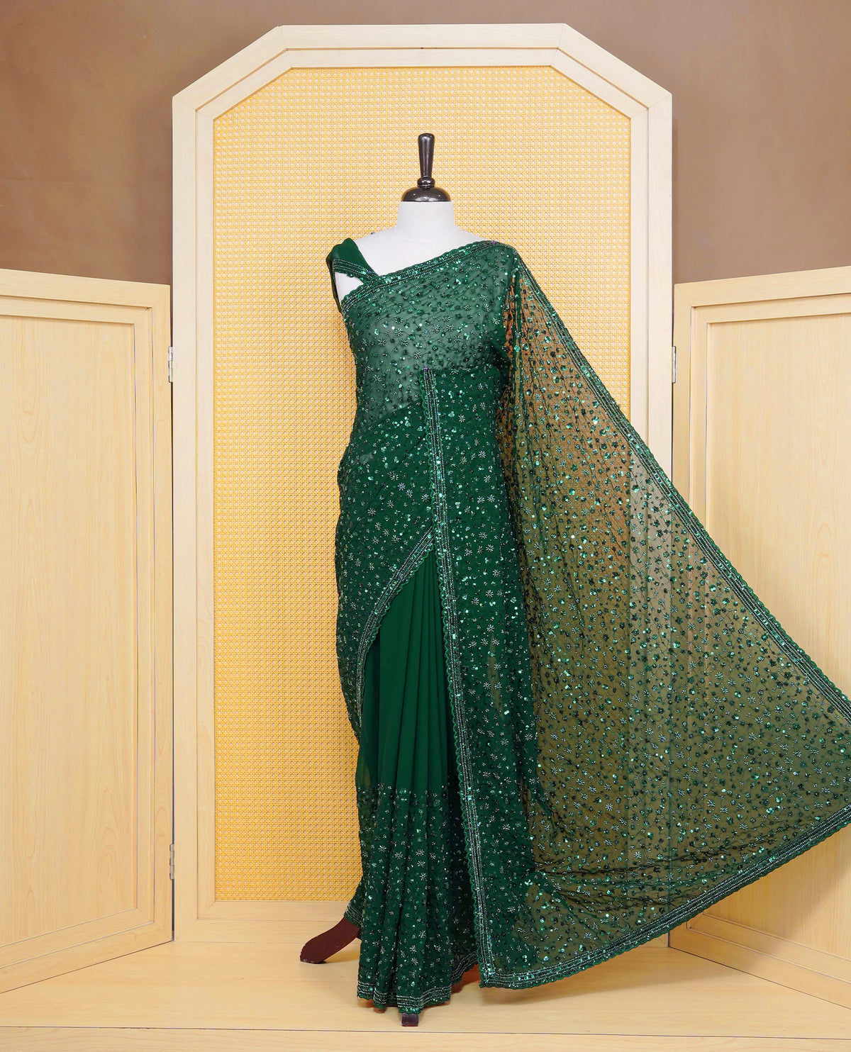 Dark Green colour Organza saree with Cut Beats & Sequins.