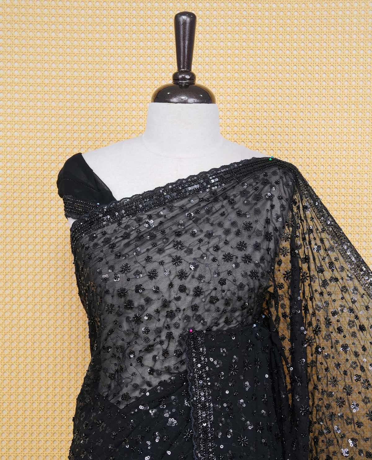 Black colour Organza saree with Cut Beats & Sequins.
