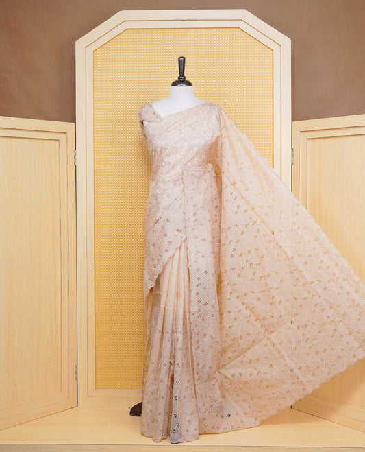 Beige colour Crush organza saree with Thread work.