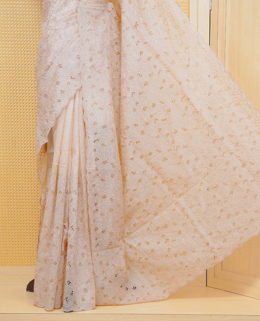 Beige colour Crush organza saree with Thread work.